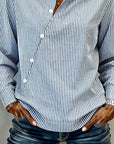 An Asymmetric Button-Down Striped Blouse
